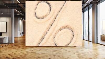 % symbol written on sand Wall mural