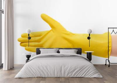 Close up of female hand in yellow protective rubber glove giving for handshake against white background Wall mural