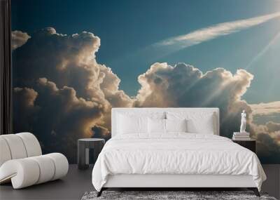 A playful sun peeking out from behind fluffy white clouds, bringing a sense of joy and warmth to a summer day.  Wall mural