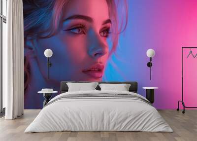 A closeup neon portrait of a woman in pink and blue, radiating glamour and elegance Wall mural