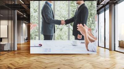 businessmans handshake on team meeting startup office Wall mural