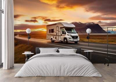 RV Motorhome camper van road trip. Tourists in rental car campervan by view of mountains in beautiful nature landscape on the road in Iceland at sunset. People on travel vacation adventure. Wall mural