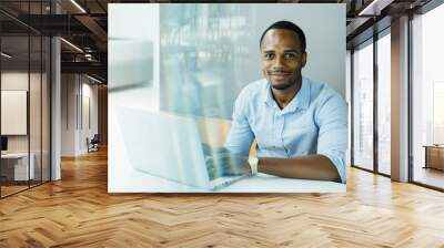 business man working on laptop computer in modern office space Wall mural