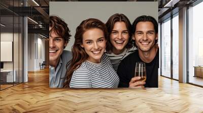 A group of friends or siblings smiling at the camera; people celebrating and smiling; white teeth and smiles; portrait photography; light gray background; white caucasian group of people Wall mural