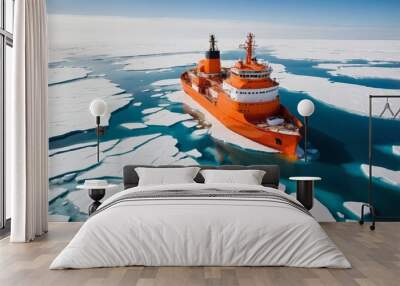 Aerial view of orange icebreaker ship navigating through icy waters Wall mural