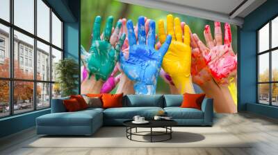 Colorful Painted Hands of Playful Children in a Park Wall mural