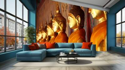 golden Buddha image arrange in arcade, Bangkok, Thailand Wall mural