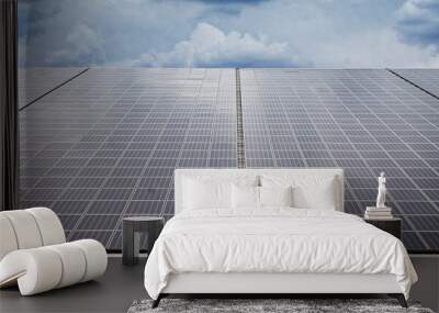 Two rows of a mega photovoltaic facility with over two megawatt on a roof of a very huge hall Wall mural