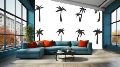 Palm tree set. 8 black palm tree icons isolated on white background. Palm tree silhouettes. Vector illustration Wall mural