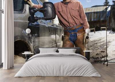 Man Wearing Cowboy Hat Standing Beside Truck Wall mural