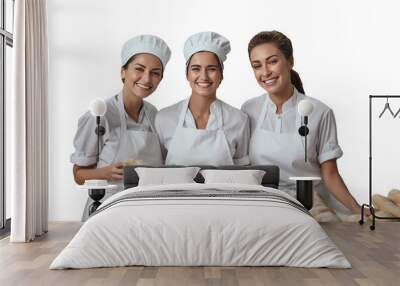 Baker team with fresh pastries, smiling in a bakery Wall mural