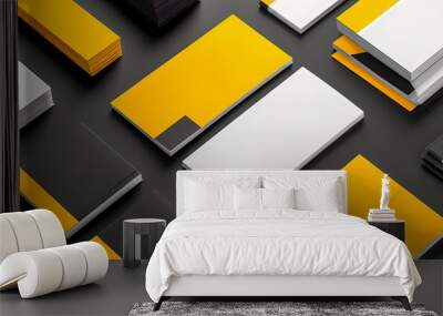 A collection of business cards and envelopes with a black and yellow design Wall mural