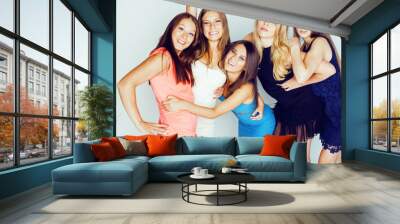 group of many cool modern girls in bright clothers together having fun isolated on white background, happy smiling lifestyle people concept Wall mural