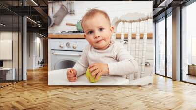 little cute boy in chair on kitchen in morning, lifestyle people concept Wall mural