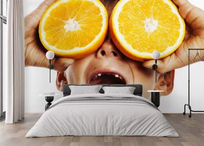 little cute boy with orange fruit double isolated on white smili Wall mural