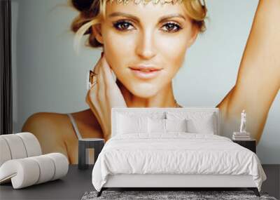 young blond woman dressed like ancient greek godess, gold jewelr Wall mural