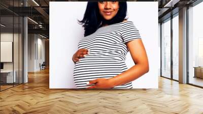 young pretty african american woman pregnant happy smiling, posi Wall mural