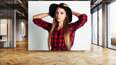 young pretty brunette girl hipster in hat on white background casual close up dreaming smiling Wall mural