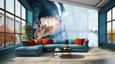 AI, Artificial Intelligence and machine learning, Businessman holds a smart phone with artificial intelligence data to control the robot to work in factory, Innovative of technology and futuristic. Wall mural