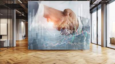 Business partnership and collaboration. Businessmen handshaking for success deal and investment to achieve growth profit in financial, stock market and business strategy solution and marketing target. Wall mural