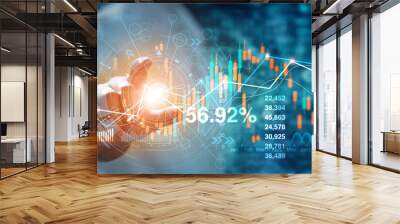 Businessman hand touching of forex graph growth interface and financial data analysis. Stock market on blue background. Wall mural