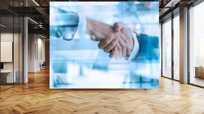 Businessman partners handshake for successful of investment deal and finishing up a meeting. Financial, marketing and teamwork . Wall mural