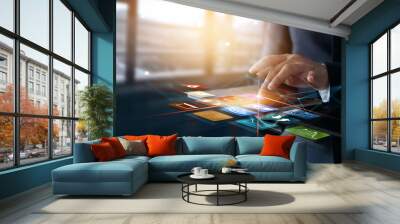 Businessman using tablet analyzing sales data and business growth on virtual interface. Business strategy. Global business. Digital marketing. Wall mural