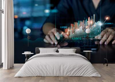 Businessman using tablet analyzing sales data and economic growth graph chart. Business planning and strategy. Analysing trading of exchange. Financial and banking. Technology digital marketing. Wall mural