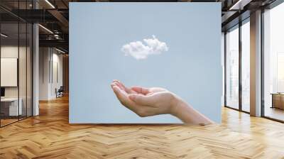 Cloud computing concept, cloud above hand of businessman Wall mural