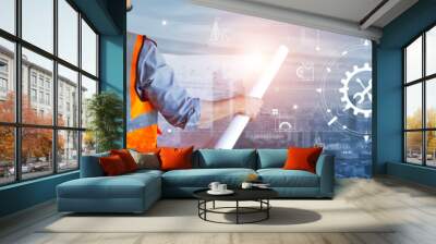 Double exposure image of construction engineer, architect or holding blueprint analyzing and construction icon on city background. Wall mural