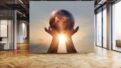 Earth at night was holding in human hands. Earth day. Energy saving concept Wall mural