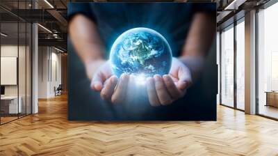 Earth day, Human hands holding blue earth, save earth concept.  Wall mural