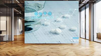 Health care and Medical, Patients' pills and water glass placed on a heartbeat report paper And a graph of the growth of medical and healthcare businesses. Wall mural