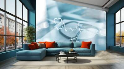 stethoscope with heart beat report and doctor analyzing checkup on laptop in health medical laborato Wall mural