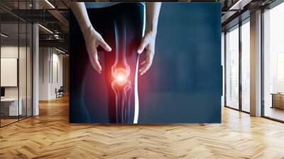 Woman suffering from pain in knee, Injury from workout and osteoarthritis, Tendon problems and Joint inflammation on dark background. Wall mural