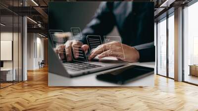 Typing on a laptop with digital documents and checklists floating above. It symbolizes the use of digital tools for task management, organization, and efficient workflow in a modern work environment. Wall mural