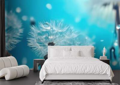 Droplets of water in Dandelion Seeds on blue beautiful background, Drops of sparkle on dandelion in rays of light Wall mural