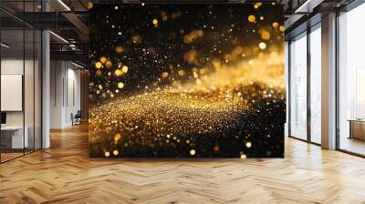 Gold glitter dust. Sparkling shining particles on a black background. Glows confetti shimmering texture Wall mural