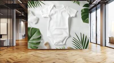 Mockup of white baby bodysuit on white background with greenery. Blank baby clothes template, flat lay. Wall mural