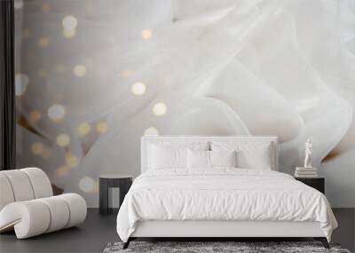 White tulle fabric background with bokeh overlay. Glitter chiffon texture, wedding concept. Wall mural