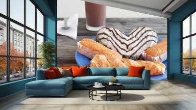 Some pastries in a plate and a chocolate milk glass Wall mural