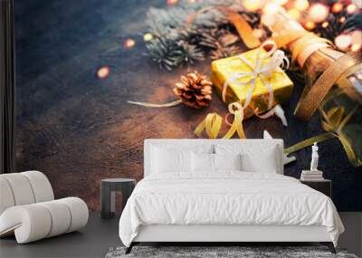 happy new year 2024 card with bottle of champagne and present gift over dark stone background Wall mural