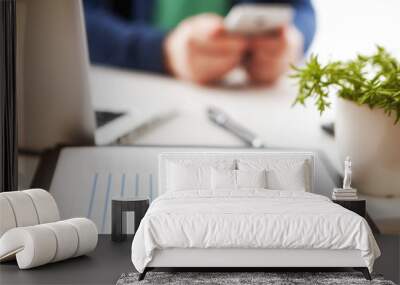 stock market chart and finger pointing on tablet in office Wall mural