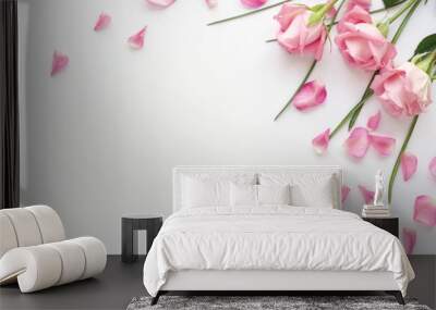 flower arrangement of pink roses and petals on a white background.holiday concept Wall mural