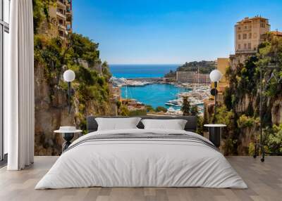 View of Monaco City with boat marina below in Monaco. Monaco City is one of the four traditional quarters. Wall mural