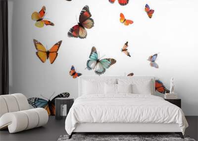 A bunch of butterflies flying in the air Wall mural