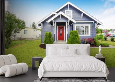 Classic American house with siding trim and red entry door Wall mural