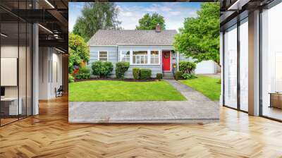 Exterior of small American house with blue paint Wall mural