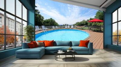 Large pool with chairs. Wall mural