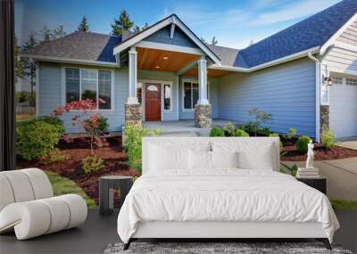 Light blue siding house . Porch with stone base columns. Wall mural